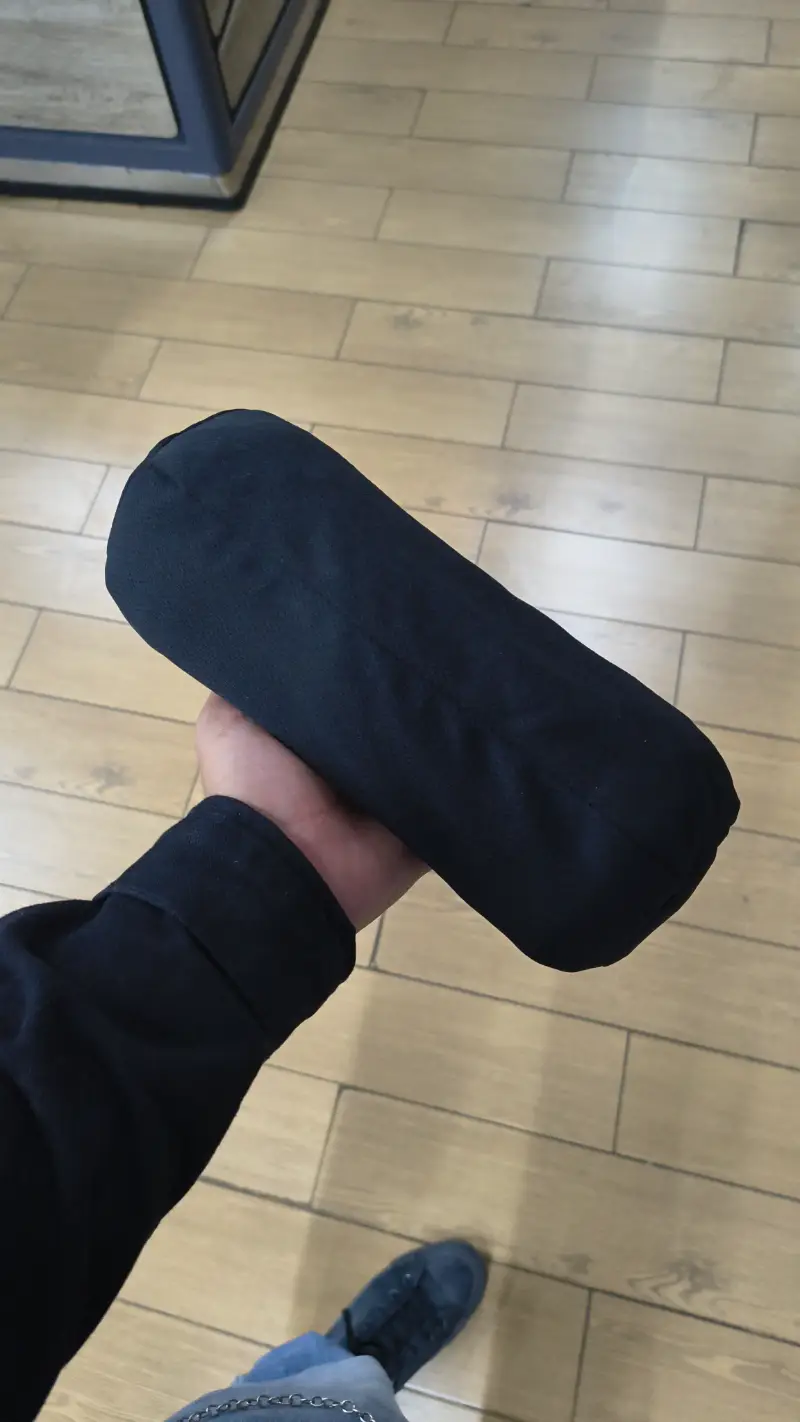 Cojín cilíndrico negro