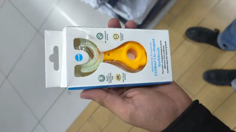 Cepillo de dientes en forma de U para niños